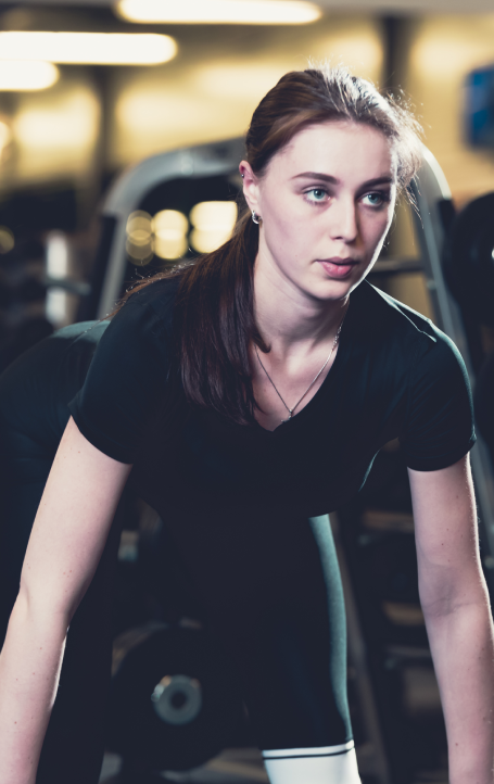 woman working out in gym woman working out in gym